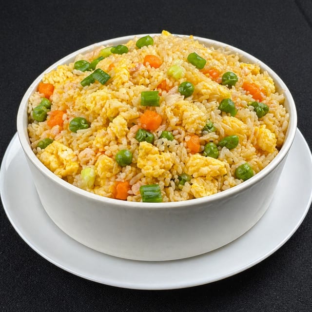 Egg Fried Rice or Hakka Noodles.
