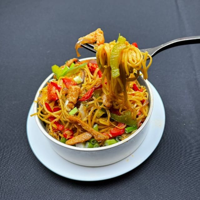 Chicken Fried Rice or Hakka Noodles.